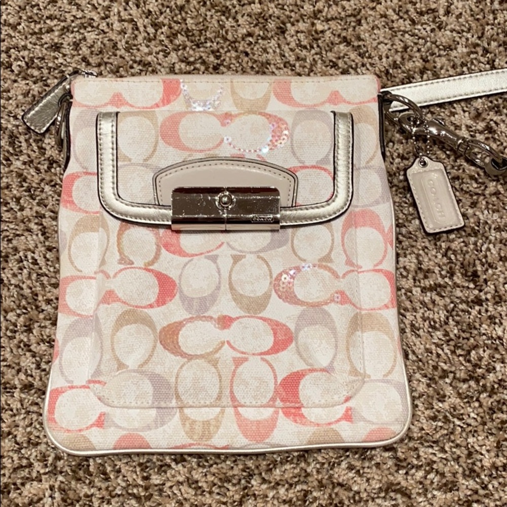 Pink and silver cross body Coach bag